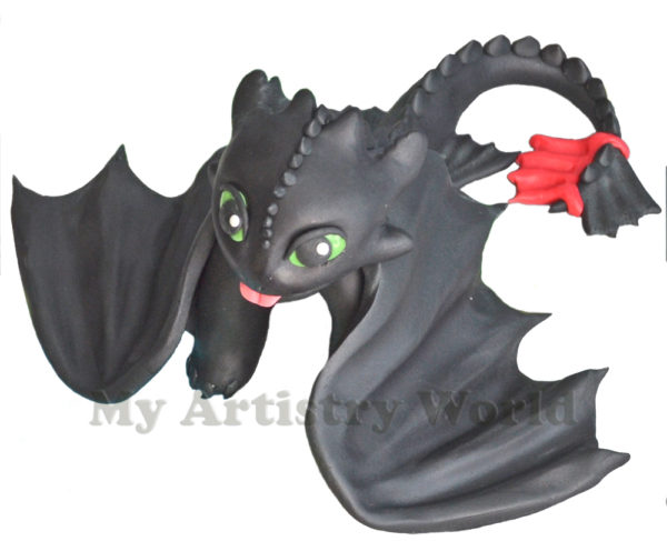 Toothless cake topper