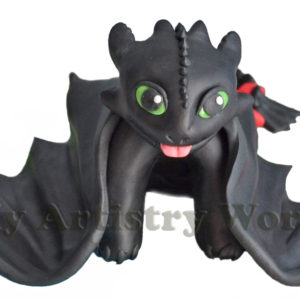 Toothless cake topper