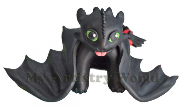 Toothless cake topper