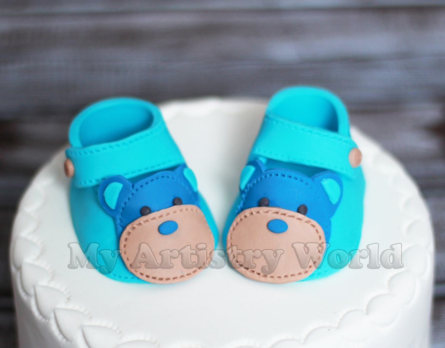 Baby shoes deals on cake