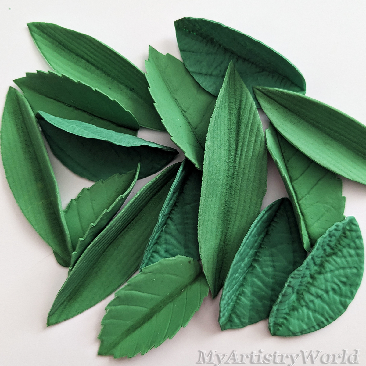 Handmade edible fondant leaves in three designs – sugar cake decorations for floral, rustic, and garden cakes