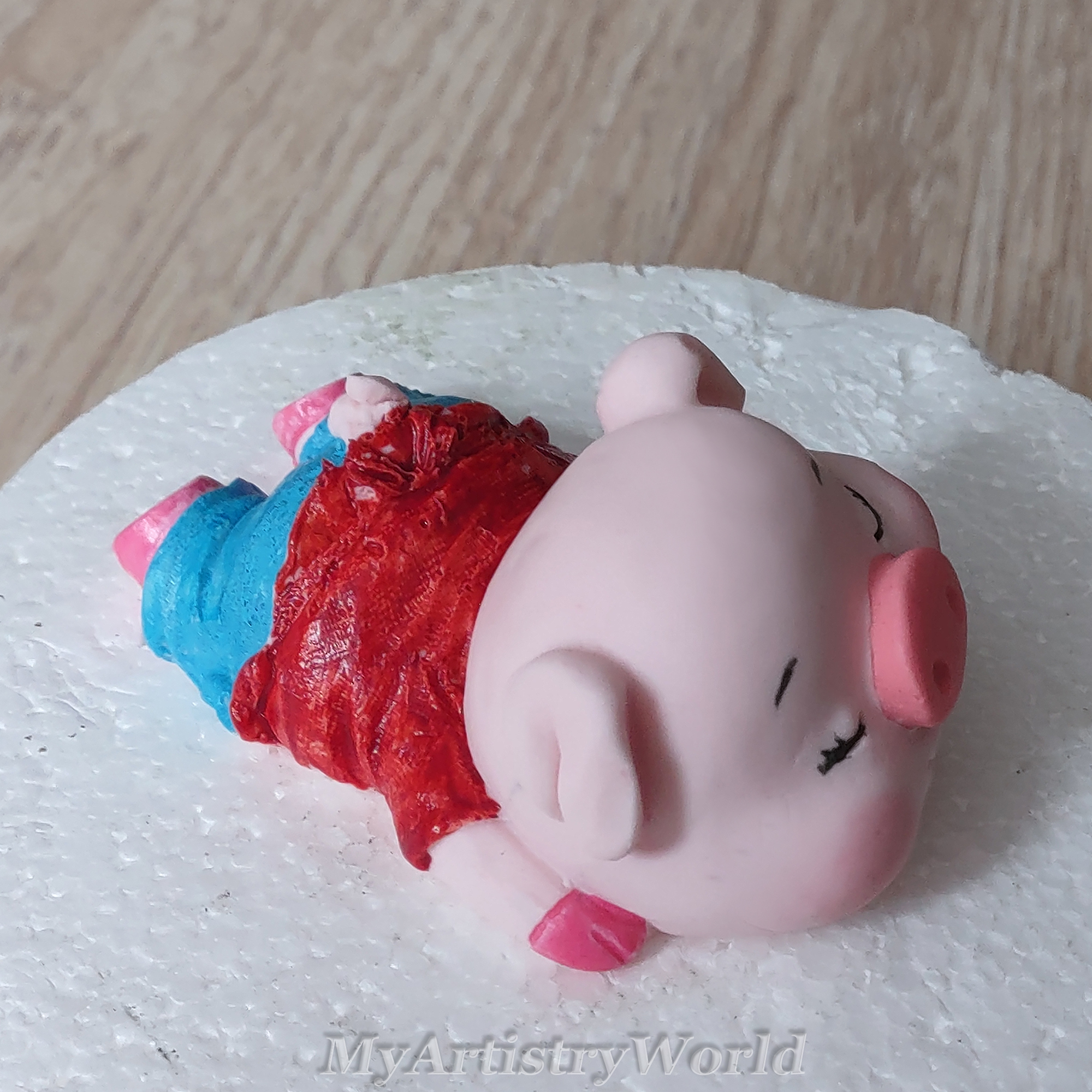 Piglet cake topper