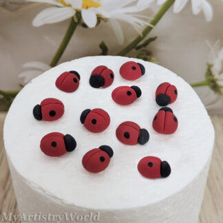Set of 12 handmade edible fondant ladybugs, approximately 0.5 inch each, for cake and cupcake decorations.