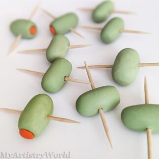 Edible fondant olives on toothpicks for cupcake and cocktail toppers