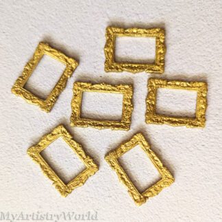 Set of 6 edible gold rectangle frames with ornate baroque design, used as cake toppers for weddings and parties.