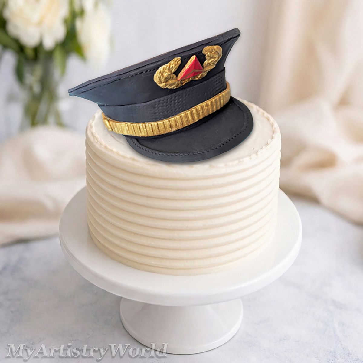 Delta-style airline pilot captain hat cake topper made from edible fondant